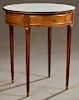French Louis XVI Style Ormolu Mounted Carved Mahogany Marble Top Bouillotte Table, early 20th c., the brass banded circular figured white marble over 