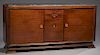 French Art Deco Carved Mahogany Ormolu Mounted Marble Top Sideboard, c. 1940, the inset highly figured black marble over a central bank of two drawers
