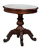 French Louis Philippe Carved Walnut Marble Top Center Table, 19th c., the inset figured white circular marble over a reeded baluster urn support, on f