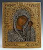 Russian Icon of the Virgin of Kazan, Moscow, first half of the 19th c., with a gilt silver filigree oklad, with a maker's mark of "A.C." in Cyrillic, 