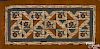 Geometric and floral shirred hooked rug
