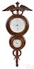 Carved walnut caduceus barometer clock