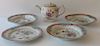 Five piece Chinese export rose famille lot including three soups, a plate, and a teapot (rim chips). 
bowl: diameter 9 inches, 
teap...
