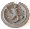 Bronze disk with classical three dimensional figure, marked on reverse: John with great appreciate and warm friendship Felix de Weld...