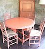 Five piece red painted set including drop leaf table, and four rush seat chairs (1 chair back rail as is). 