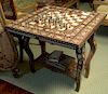 Inlaid gaming table with chess board, backgammon, and felt op, set on cabriole legs (two inlaid squares missing). 
height 27 1/4 inc...