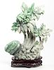 A Carved Jadeite Model of Palm Trees, Height 15 7/8 inches.