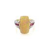 An 18K Gold Opal Diamond and Ruby Ring
