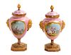 * A Pair of Sevres Lidded Urns Height 8 inches.