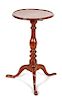 An American Tilt-Top Occasional Table Height 29 1/2 x diameter 16 3/4 inches.
