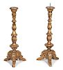A Pair of Italian Rococo Style Carved Giltwood Pricket Candlesticks Height 33 1/2 inches.