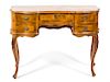 An Italian Rococo Style Walnut Serpentine Desk Height 31 1/4 x width 42 x depth 20 inches.