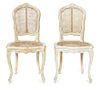 A Pair of Louis XV Cane Back Painted Side Chairs Height 35 1/2 inches.