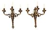 A Pair of Louis XVI Style Gilt Bronze Three-Light Wall Sconces Height 20 x length 19 inches.