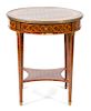 A Louis XVI Style Parquetry Inlaid Gilt Bronze Mounted Gueridon Height 29 1/2 x diameter 25 1/2 inches.