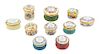 A Collection of Ten Enameled Pill Boxes Diameter of largest 2 1/4 inches.