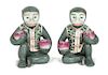 A Pair of Chinese Polychrome Glazed Ceramic Seated Monkey-Form Candleholders Height 7 1/4 inches.