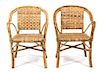 Four Rattan Open Armchairs Height 34 inches.