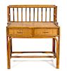 A Bamboo and Rattan Desk Height 42 x width 35 1/2 x depth 23 inches.