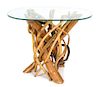 A Twisted Bamboo Glass Top Table Height 30 x width 38 x depth 26 3/4 inches.