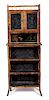 A Victorian Style Burnt Bamboo and Lacquer Display Cabinet Height 73 x width 29 x depth 12 1/2 inches.