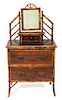 A Victorian Style Burnt Bamboo Dressing Table Height 54 x width 29 x depth 17 inches.