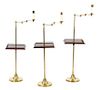 A Collection of Three Vaughan Brass Floor Lamps Height of tallest (to top of candlestick) 50 inches.