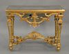 Continental style gilt console table with inset mirrors. ht. 36 in., top: 20" x 45"