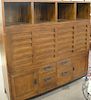 Contemporary cabinet with fall front desk. ht. 66 in., wd. 64 in.