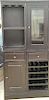 Contemporary four part cabinet. ht. 72 in., wd. 34 in.