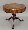 Weiman leather top shaped drum table with drawer. ht. 28 in., dia. 34 in.
