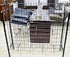 Seven piece lot to include five large metal wines racks and two smaller wine racks. large racks: ht. 51 in. & 54 in.