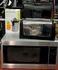 Group of electronics including Rowenta steam iron, Sharp microwave, Dualit toaster, etc.