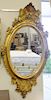 Victorian oval gilt mirror. 56" x 30"