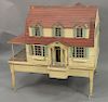 Large vintage doll house with furnishings, six rooms plus covered porch, all on stand. ht. 48 in., wd. 48 in., dp. 36 in.