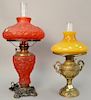 Two Gone with the Wind lamps, one having frosted red glass and the other Victorian brass with caramel glass shade. ht. 28 in. & 21 in.