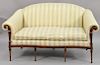 E. J. Victor pair of mahogany upholstered loveseats (one with sun fading on back and small tears). ht. 39 in., wd. 57 in.