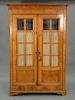 Continental style two door cabinet. ht. 84 in., wd. 56 in.
