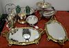 Group lot to include silverplate teapot (ht. 10 in.), two biscuit jars, figural compote, and two bureau plats with brass frame. Prov...