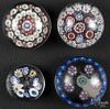 Four antique millefiore paperweights, largest - 2'' dia.
