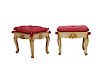 Pair of Continental Creme Painted Parcel Gilt Footstools, with red silk tasseled seats, 18th century