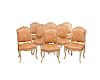 Suite of Eight Louis XV Style Carved and Creme Painted Dining Chairs, 20th century