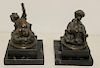 UNSIGNED. 2 Bronze Putti on Marble Bases.