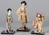 Three vintage Japanese Nishi geisha dolls, one with a case, another titled Fujimusume