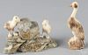 Alaskan Inuit stone and fossilized ivory carving of puffins on a rock, 3 1/4'' h., 5 3/4'' w.