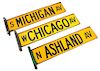 Three Enameled Chicago Street Signs Width with bracket 26 3/4 inches.