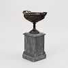Continental Neoclassical Bronze Urn with Fruiting Vine Motif on a Grey Marble Base