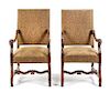 A Pair of Louis XIII Style Armchairs Height 45 inches.