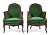 A Pair of Louis XV Beech Fauteuils Height 33 inches.