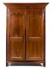 A French Provincial Walnut Armoire Height 78 1/2 x width 51 inches.